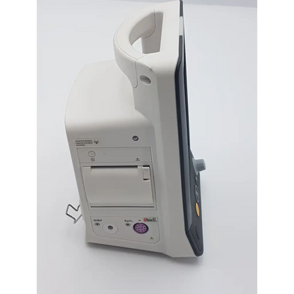 White mindray accutorr 7 vital signs monitor with handle gray side panel and labeled nibp and spo2 ports on back side