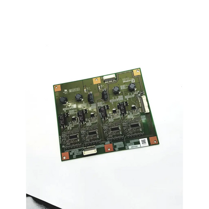 Green rectangular minebea dm63009 u84pa-e0015436a inverter board with black components and gold mounting corners