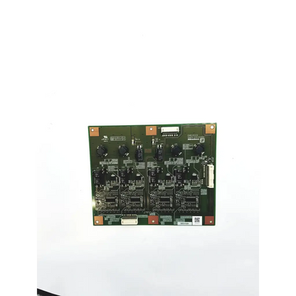 Green rectangular minebea dm63009 u84pa-e0015436a inverter board with black components and copper-colored mounting tabs