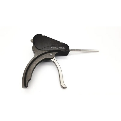 Black and silver metal versalok deployment gun with textured grip handle branded deary mitch on the head