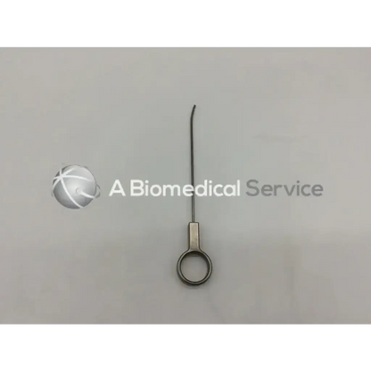 A sleek metallic mitek surgical rapidlok pusher with a curved tip and circular handle for precise surgical use