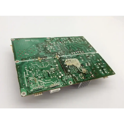Green printed circuit board with intricate copper traces and components of mitsubishi 934c2280 power supply unit