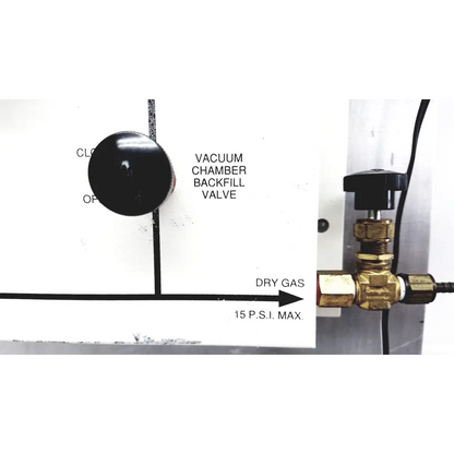 Gold brass vacuum control manifold valve with black knob and threaded connections on mmr technologies system panel