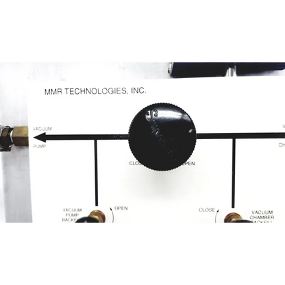 Black circular knob with textured grip and embossed logo on mmr technologies vacuum control manifold system panel