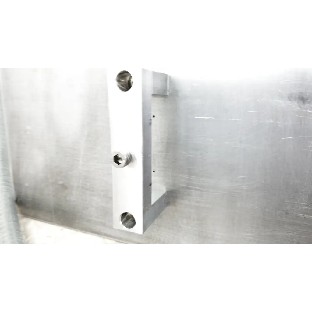 Silver metallic rectangular bracket with three holes and hexagonal bolt for mmr technologies vacuum control manifold system