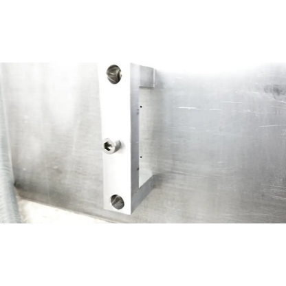 Silver metallic rectangular bracket with three holes and hexagonal bolt for mmr technologies vacuum control manifold system