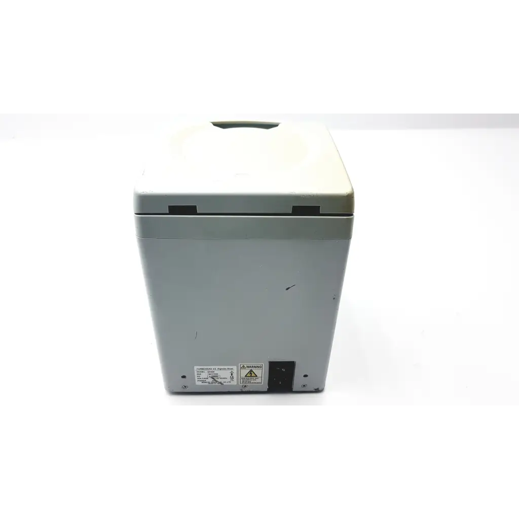 Beige and gray monitex industrial turbomax v3 aligate mixer gx300 laboratory centrifuge with hinged lid and warning labels on back