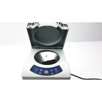 White countertop monitex industrial turbomax v3 aligate mixer gx300 with blue panel and open empty rotor chamber