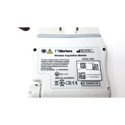 White plastic mortara instrument wireless acquisition module with model wam label and regulatory compliance markings