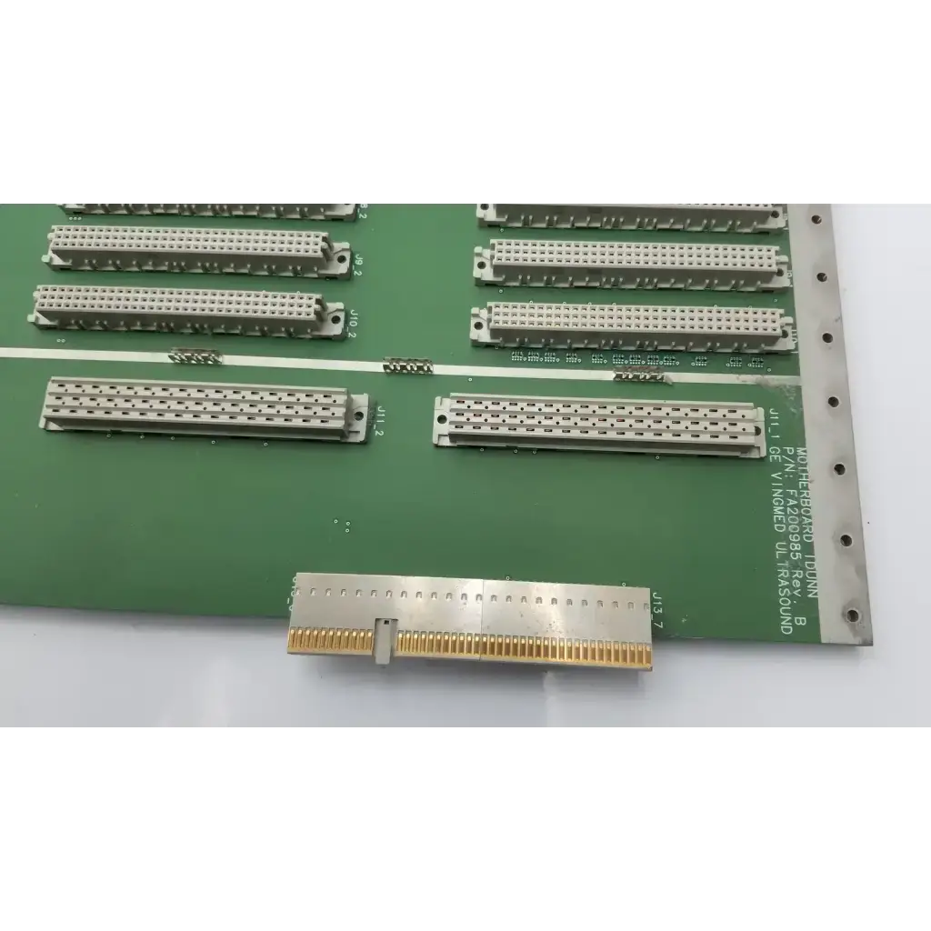 Silver rectangular d-sub connector with gold-plated pins and white housing on motherboard idunn fa200985 rev vingmed ultrasound