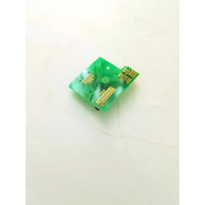 Green plastic motor base relay cartridge with gold electrical contacts and printed labels for motor base relay 60000 series