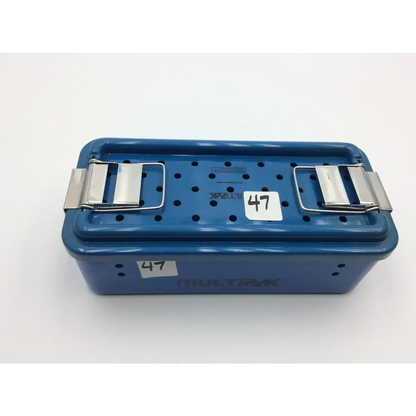 Blue plastic multipak 5006-50-000p sterilization container with silver metal latches and perforated lid for surgical instruments