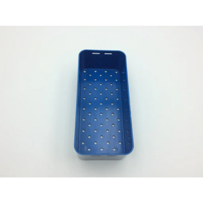 Blue plastic tray with a grid of circular holes in the multipak 5006-50-000p sterilization container for medical use