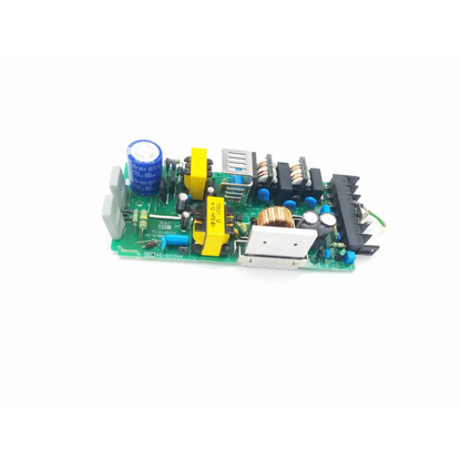 Nagano Japan AHS100-24 power supply board with green PCB, blue capacitors, yellow components, and black connectors