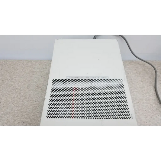 White rectangular national instruments pxi express chassis with perforated front panel and gray power cord for data acquisition