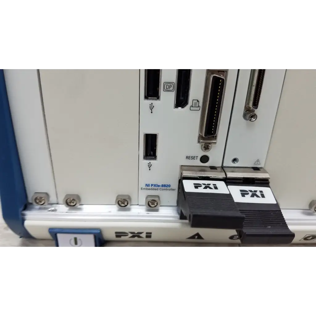Black national instruments pxi express interface connectors with white labels on white ni pxie-8820 embedded controller chassis