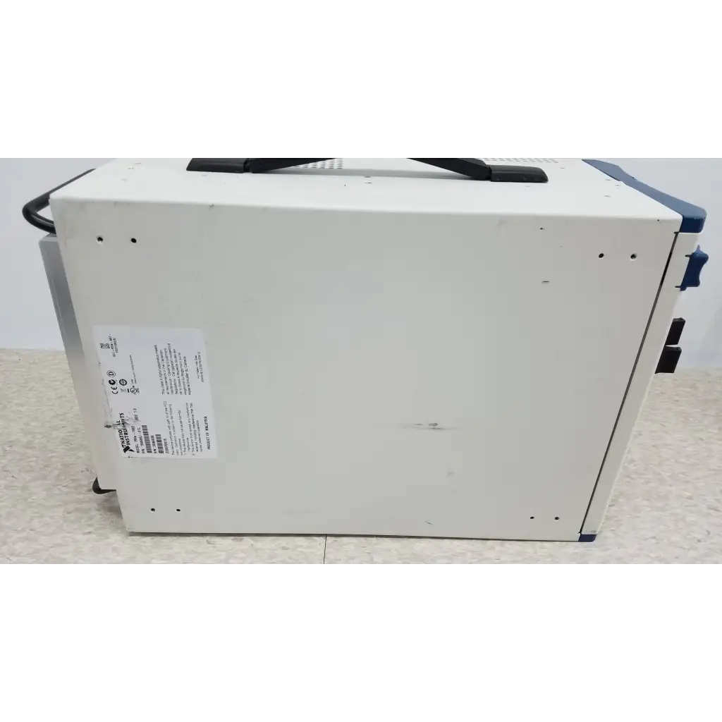 White rectangular national instruments pxi express chassis with black handle and blue accents for data acquisition modules