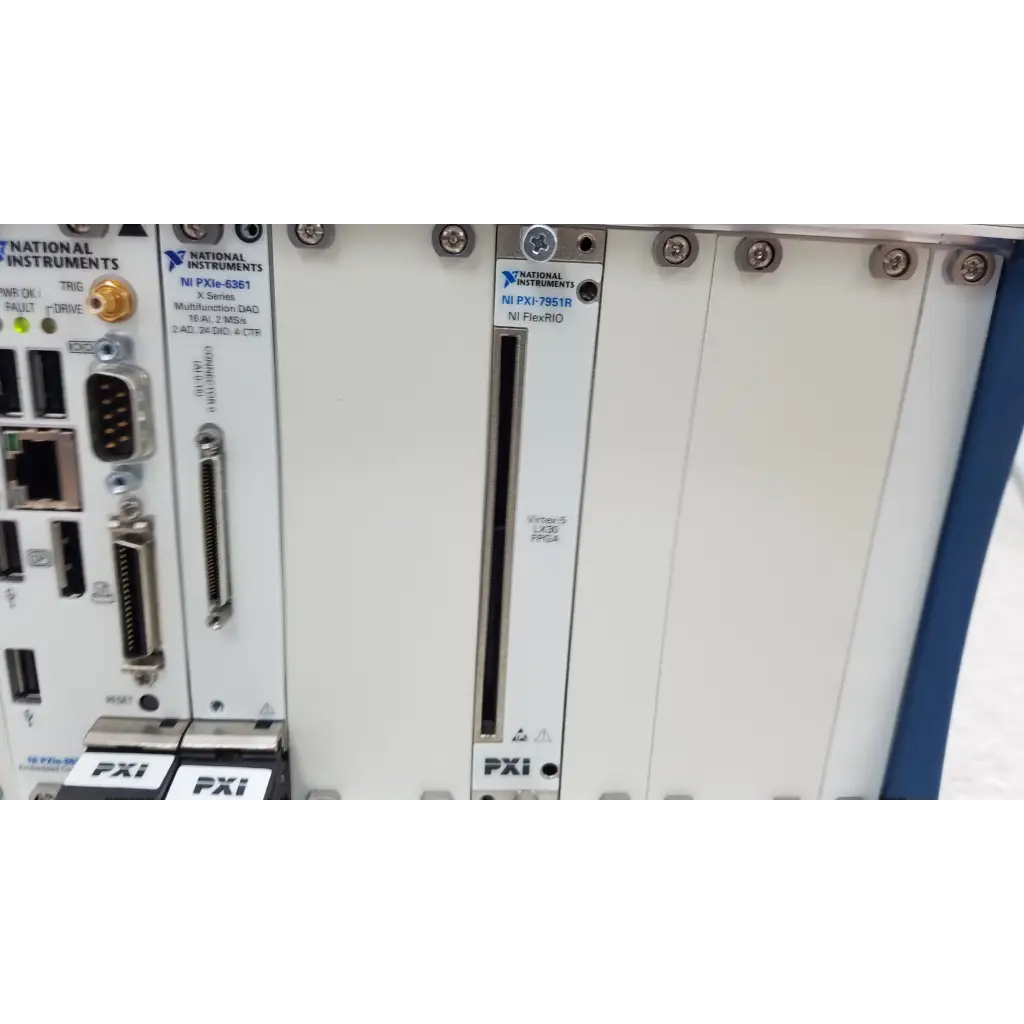 White national instruments pxi express module with vertical slot labeled ni pxi-7951r for data acquisition use