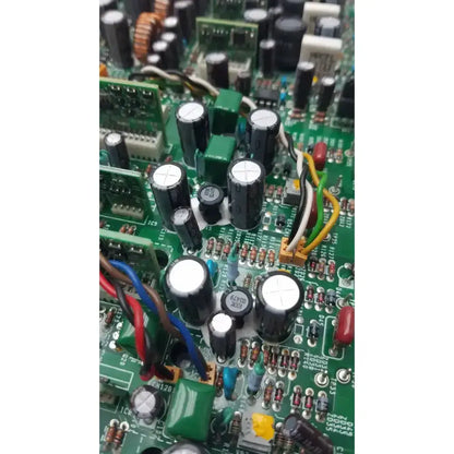 Nayuta NB497 SPU-10 94V-0 green power supply control board with black cylindrical capacitors and electronic components