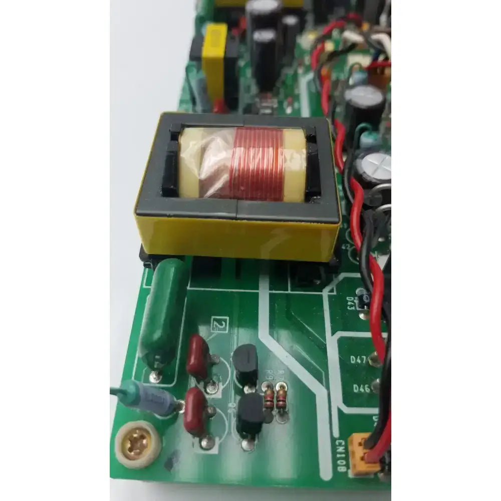 Yellow rectangular transformer with red wire coil on green circuit board in nayuta nb497 spu-10 94v-0 power supply control board