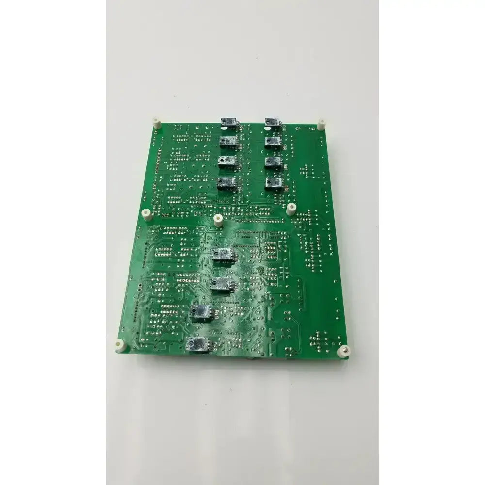 Green rectangular Nayuta NB497 SPU-10 power supply control board with black components and white mounting screws