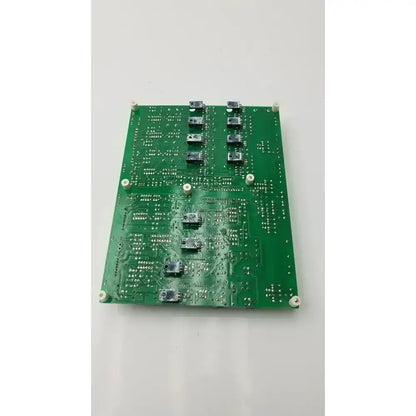 Green rectangular Nayuta NB497 SPU-10 power supply control board with black components and white mounting screws
