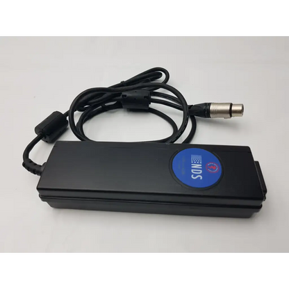 Black rectangular medical power supply bpm150s24f06 with coiled cable and silver xlr connector featuring blue inds sticker