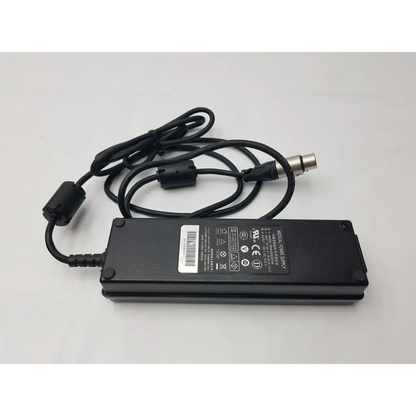 Black rectangular NDS BPM150S24F06 medical power supply AC adapter with coiled cable and metallic connector
