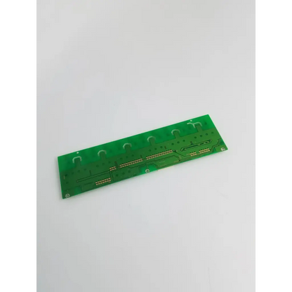 Green rectangular 009t304 backlight inverter board with gold conductive traces and circular mounting holes