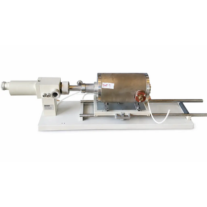 A biomed certified netzsch dil high-temperature horizontal dilatometer with brass finish and copper fittings on white base