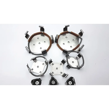 Set of metallic circular and hexagonal ice cleats with black grips for brunswick scientific innova incubator 4080