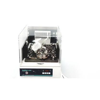 White new brunswick scientific innova incubator 4080 with transparent acrylic lid and black interior holding metal test tubes