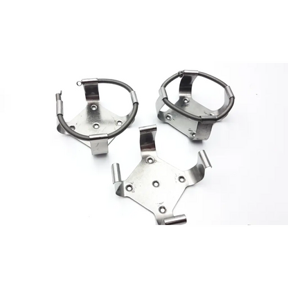 Silver metallic bottle clamps with spring-loaded bands and adjustable brackets on brunswick scientific innova incubator 4080