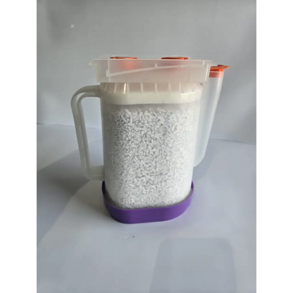 Clear plastic pitcher with orange spout caps and purple base filled with healthcare zplege-01 absorbent granules