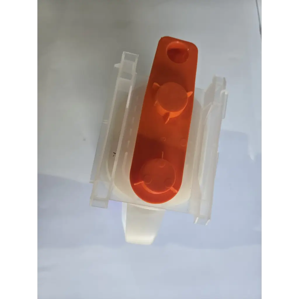 Orange plastic ice cube tray with three circular compartments and white base for healthcare zplege-01 absorbent granules use