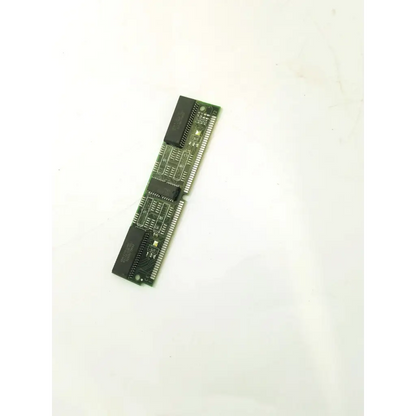 Green circuit board memory module with black integrated circuits and metallic contacts for nf03601c-61-t6 control board