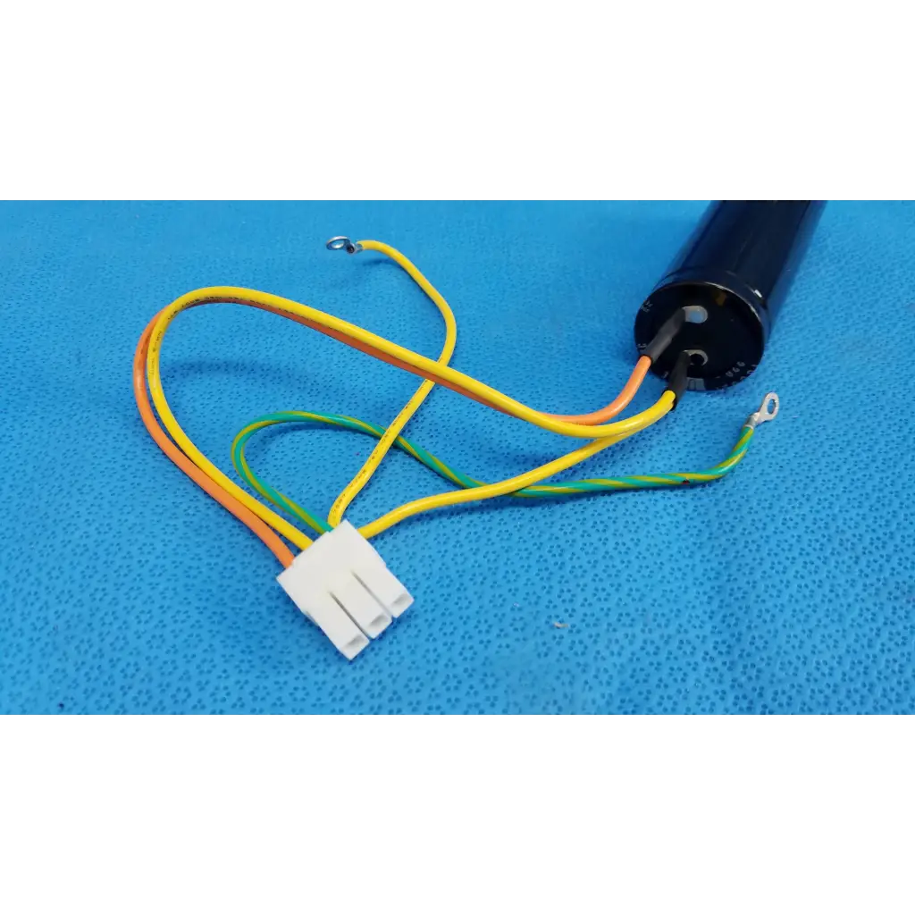 Black cylindrical nichicon power supply capacitor with yellow orange green wires for fundus retinal camera