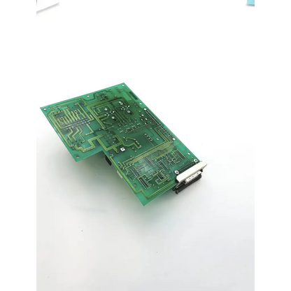 Green printed circuit board with intricate copper traces and components on the nichicon sno-6a board surface