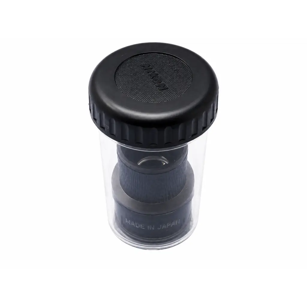 Black nikon lens cap with textured grip and clear plastic container for nikon cfi 15x microscope eyepiece case biomed certified