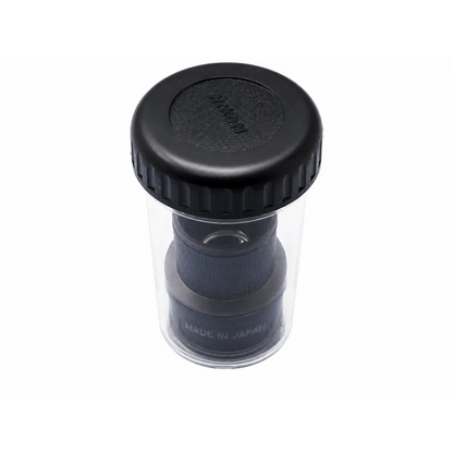 Black nikon lens cap with textured grip and clear plastic container for nikon cfi 15x microscope eyepiece case biomed certified