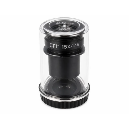 Black nikon cfi 15x microscope eyepiece lens in clear protective case with silver accents made in japan branding
