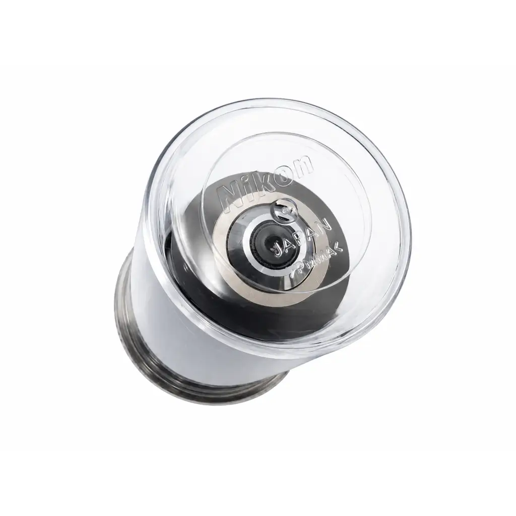Clear plastic Nikon MRH00401 CFI microscope objective lens cap with silver metallic interior and engraved branding for medical equipment