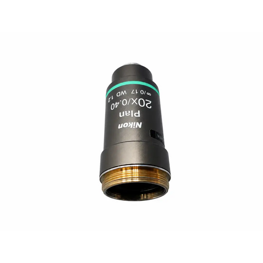 Nikon Plan 20x microscope objective with black body, green ring, and gold threaded mount