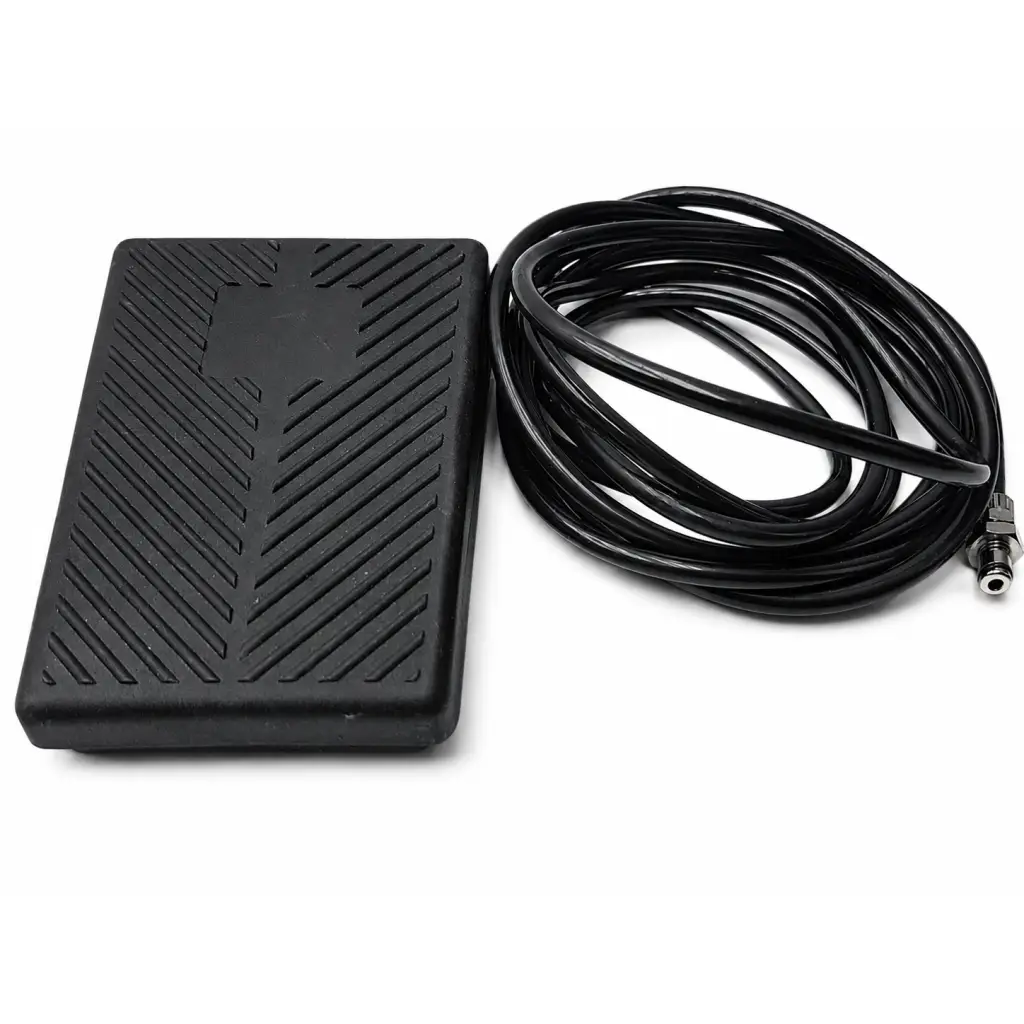 Black rubber biomed certified pressair trol b621a foot pedal with diagonal ribbed texture and coiled black cable