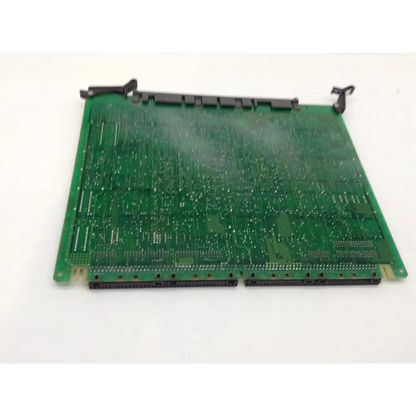 Green rectangular circuit board with black connectors and metallic components for nothern telecom ntak02ba rise module