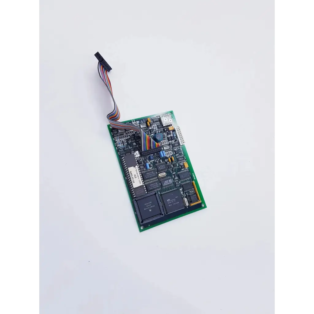 Green rectangular nibp assembly board with black components and multicolored ribbon cable for spacelabs mpc860 cpu controller
