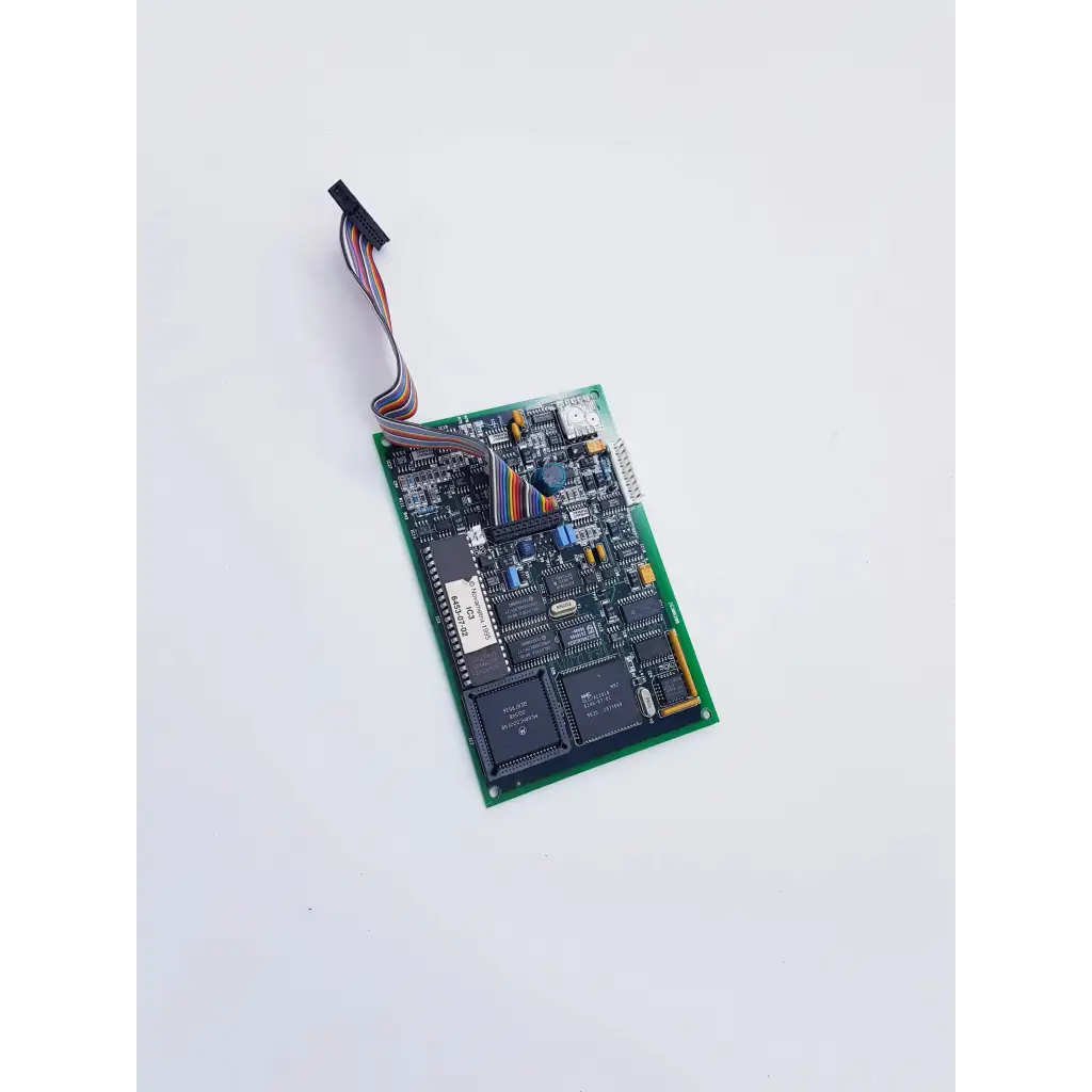 Novametrix 25300001 controller showing green nibp assembly board with spacelabs mpc860 cpu and multicolored ribbon cable