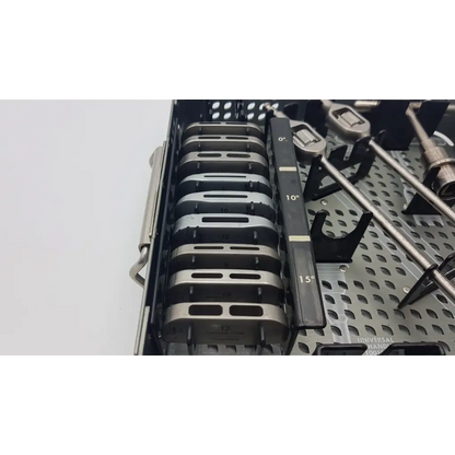 Silver surgical drill bits with angled markings in a sterile nuvasive xlw instrument tray 6900022 for precision use