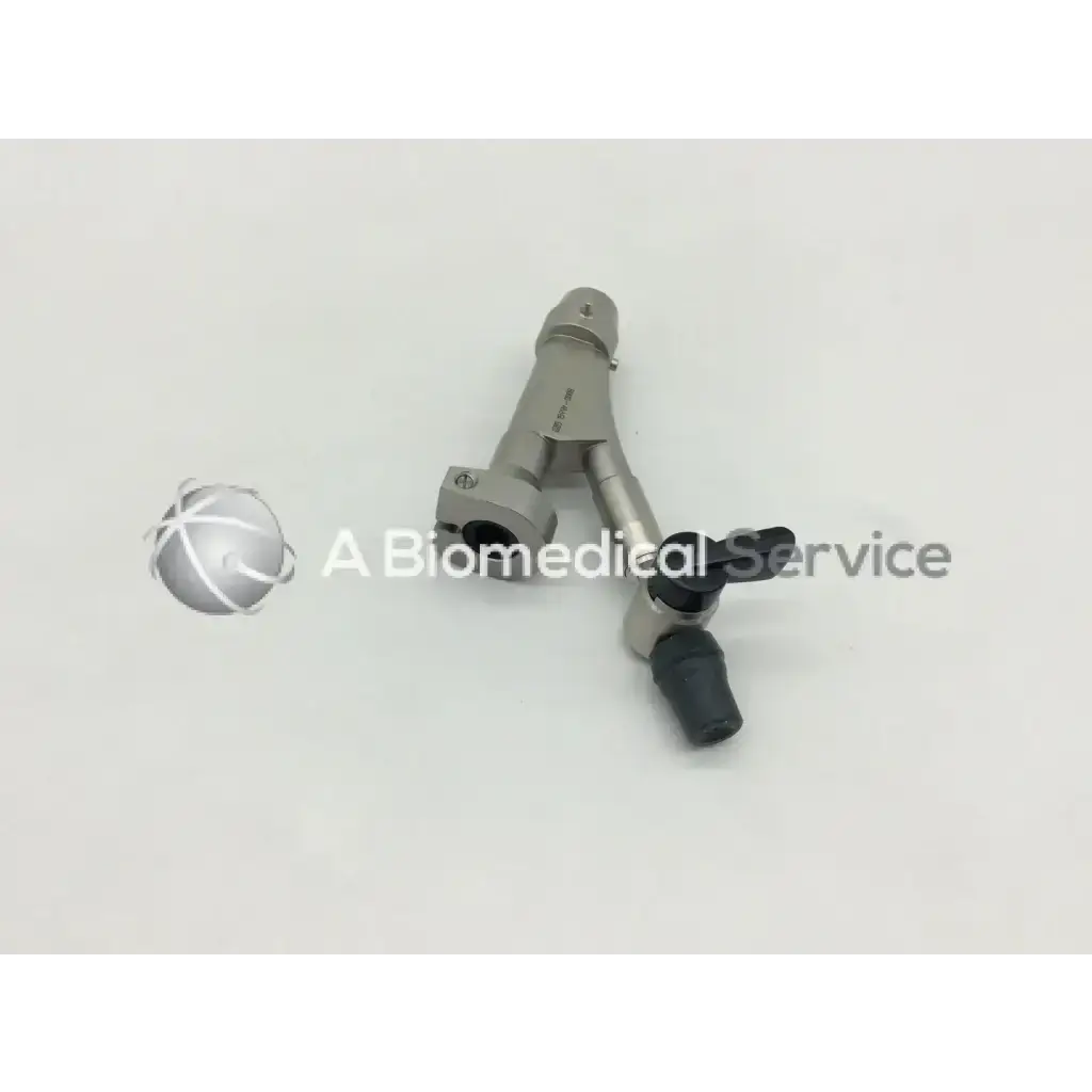 Silver metallic surgical instrument with black rubber grips and y-shaped design olympus a20976a single bridge