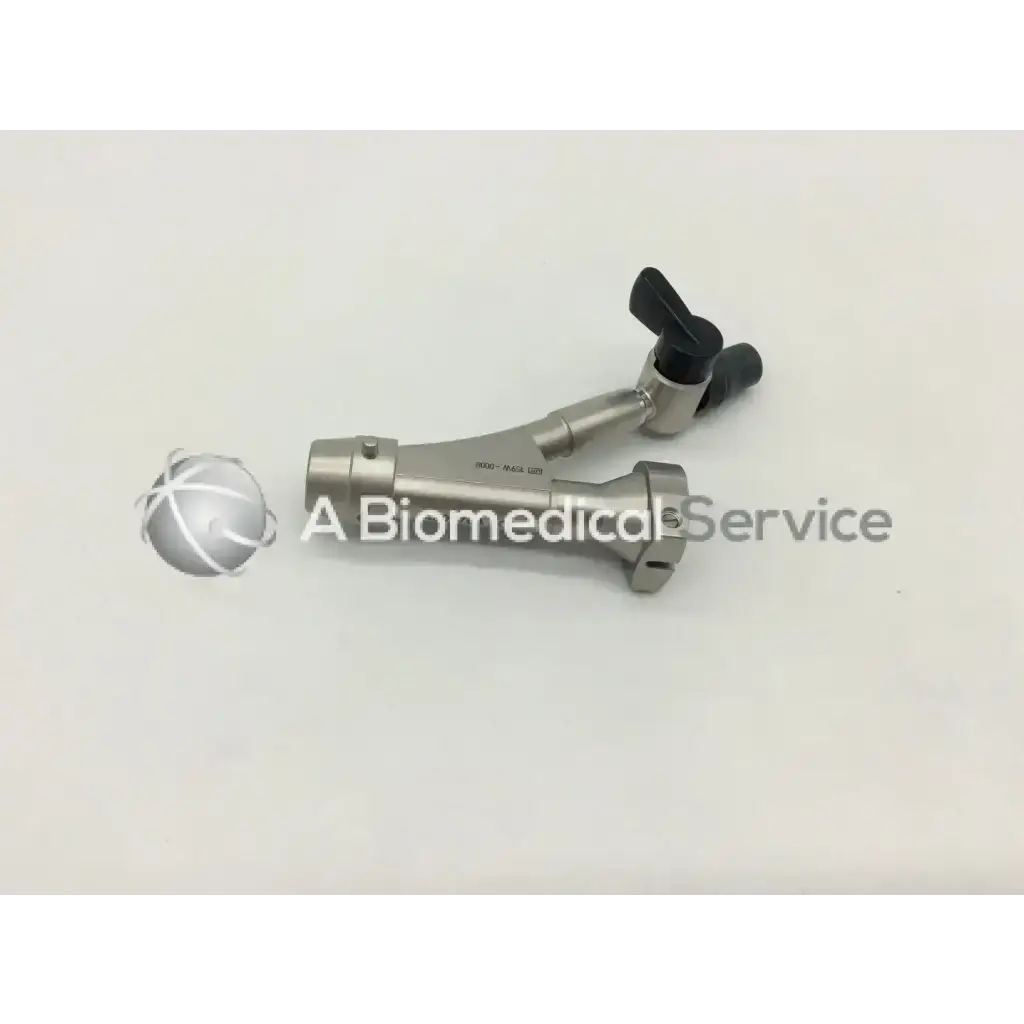 Silver surgical instrument with black ergonomic handles and a spherical component shown with olympus a20976a single bridge
